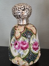 EDWARDIAN STERLING SILVER REPOUSSE TOPPED PORCELAIN SCENT BOTTLE Birmingham 1906 EDWARDIAN STERLING SILVER REPOUSSE TOPPED PORCELAIN SCENT BOTTLE Birmingham 1906 - Image 1
