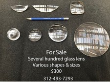 several hundred craft glass lens of various sizes