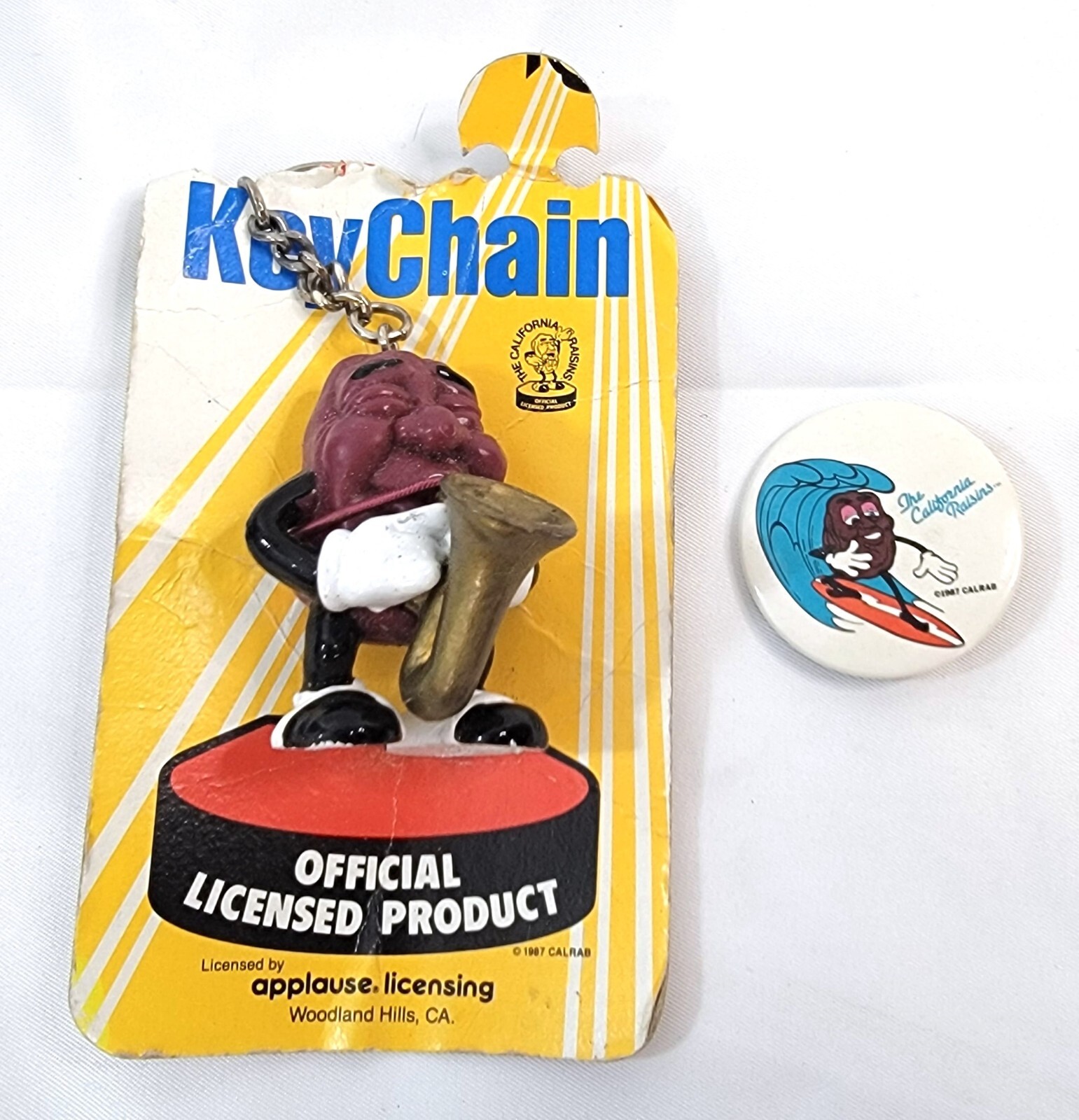 Calafornia Raisens Amercep The California Raisins Saxophone Player 1987 Keychain and Pin ...