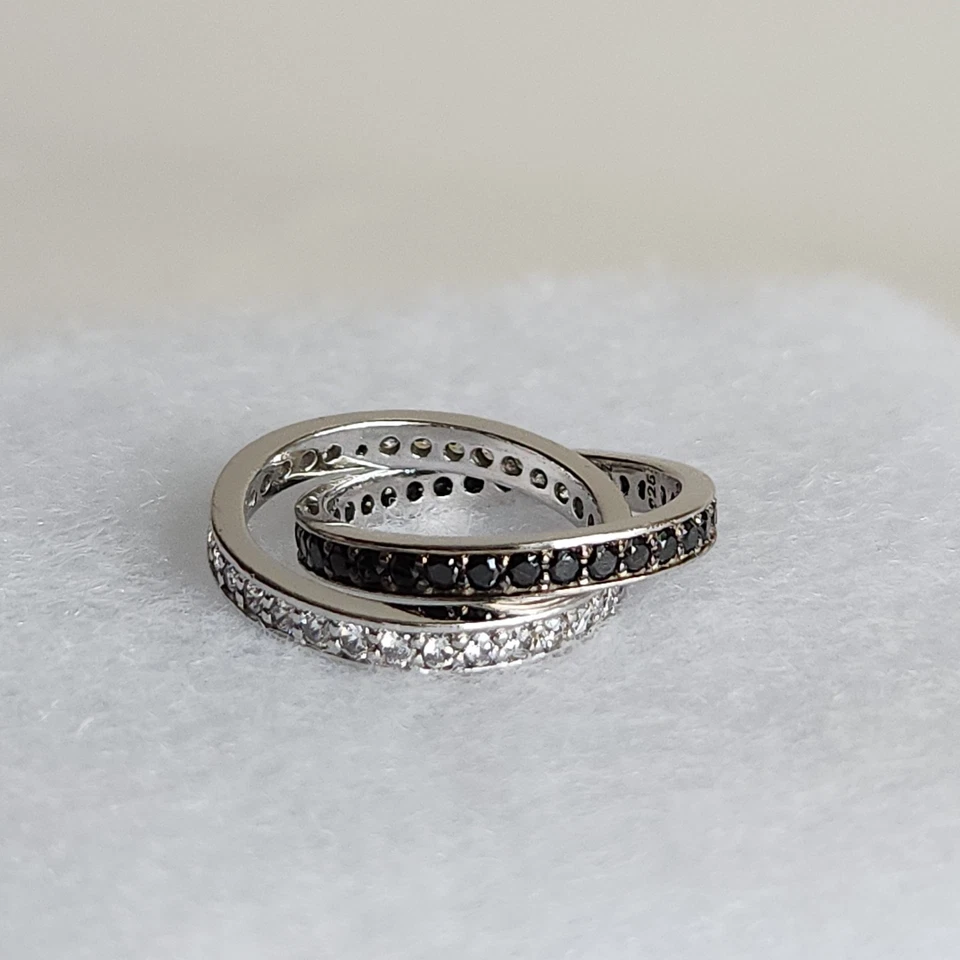 Anillo de eternidad entrelazado de plata de ley | Talla 7 | 7 g | Circonita cúbica y espinela negra | 9 Foto 3 de 4
