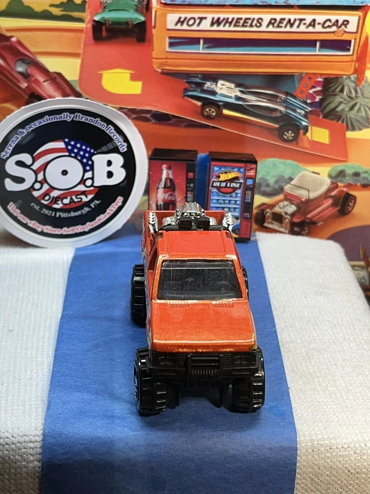 Nissan 1987 carrocería dura camioneta 4x4 naranja diecast 1:64 casi nueva Hot Wheels Foto 2 de 4