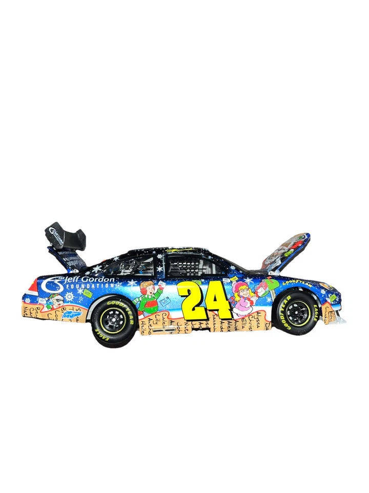 Base Sam Bass 2009 Jeff Gordon 1/24 JG color líquido navideño 1 de solo 1327 Foto 3 de 4
