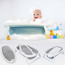 nuby baby bath with built in seat and soft headrest