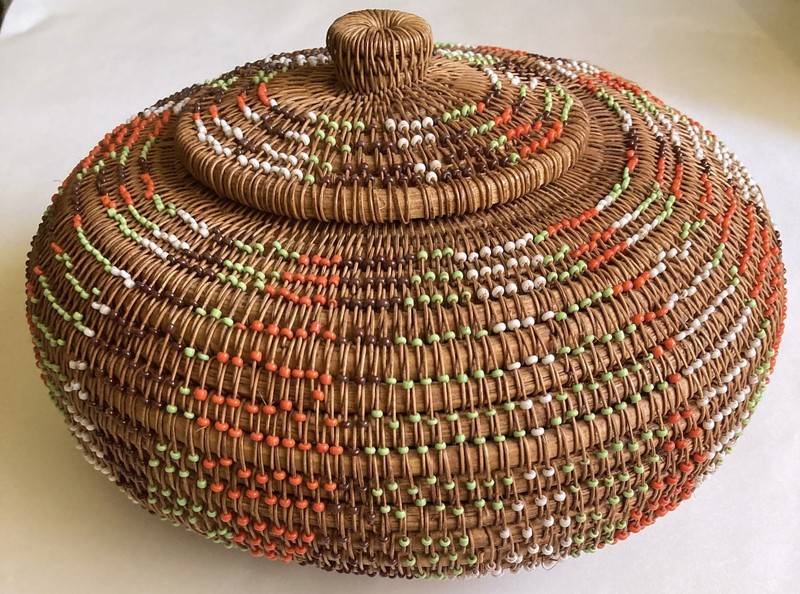 Hand woven beaded basket