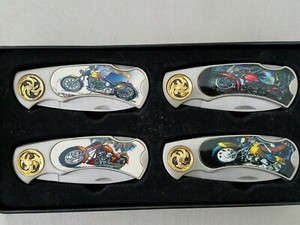 BOXED SET OF 4 MOTORCYCLES SERIES KNIVES IN A BLACK VELVET LINED TIN BOX GREAT 