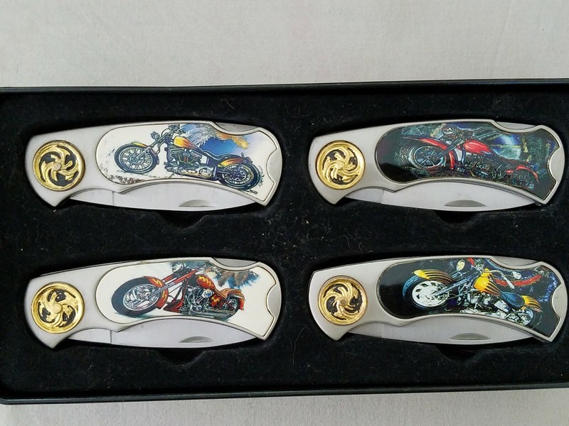 BOXED SET OF 4 MOTORCYCLES SERIES KNIVES IN A BLACK VELVET LINED TIN BOX GREAT 