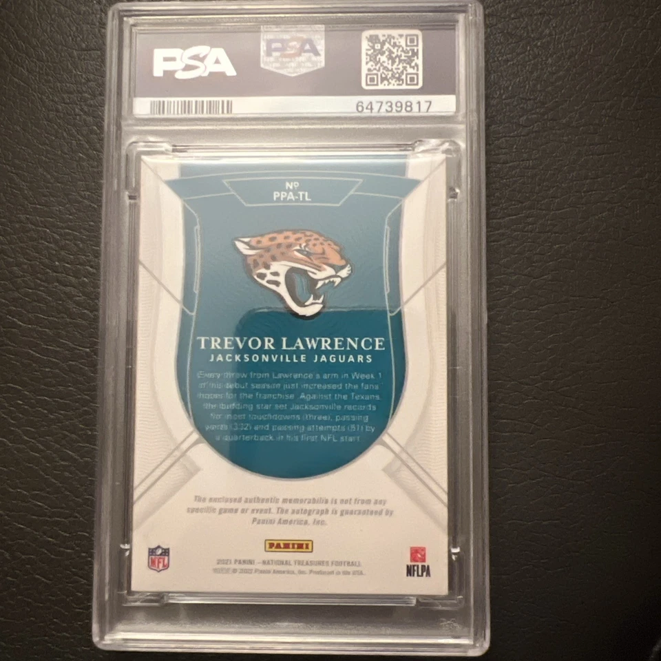 2021 NATIONAL TREASURES PRODIGY PATCH AUTOS TREVOR LAWRENCE /99 PSA 8 - Image 2 of 2
