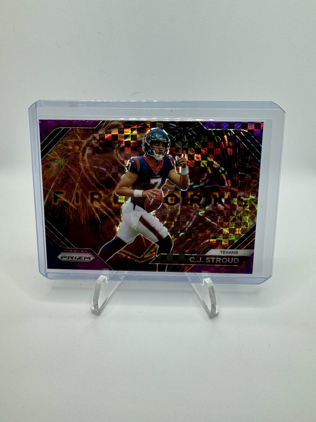 CJ STROUD 2023 PANINI PRIZM ROOKIE FIREWORKS PURPLE POWER /49 RC TEXANS