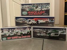 Lot of 4 Vintage Hess Trucks, 2000, 2009, 2011, 2012