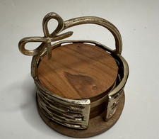 decorative set of 4 round wooden coasters in gold metal holder-handle w/ bow