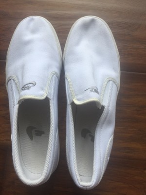 all white nike slip ons