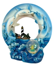 Large Ring of Dolphins swimming around a Light House