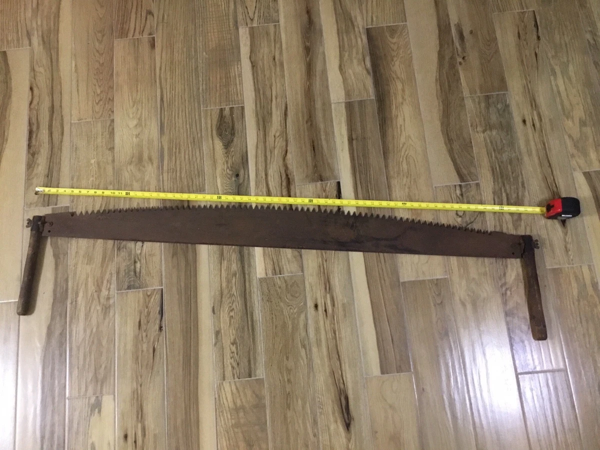 Vintage two man saw deals