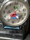 #727-VINTAGE LORUS BACKWARDS GOOFY WATCH V516-6A00 A1 SILVER  TONE W/NEW BATT. — photo 4