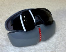 Large-size PRADA Eyewear sports sunglasses. 100 original