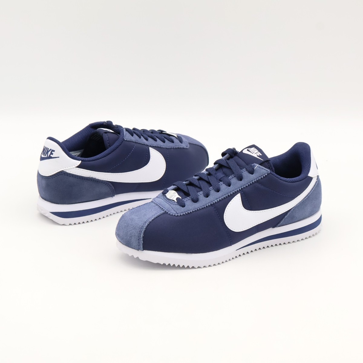 nike cortez navy blue suede