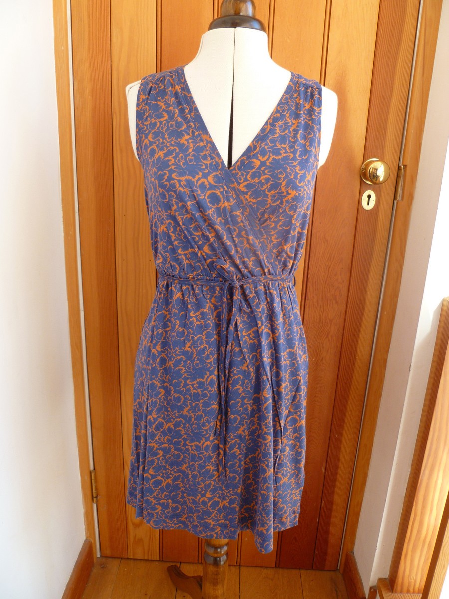 blue and orange summer dress Orange Contrast Trim Floral Split Neck Puff Short Sleeve Tiered Mini Dress Orange / L / 100%Polyester by Blue Zone Planet main image 1