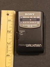 Sony Walkman SRF-49 FM/AM Radio w/Belt Clip Black Tested Working NO headphone