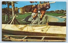 Eskimo Children in Sealskin Kayak in Arctic Region in Alaska c1960s Postcard