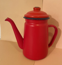 A red vintage enamel coffee pot
