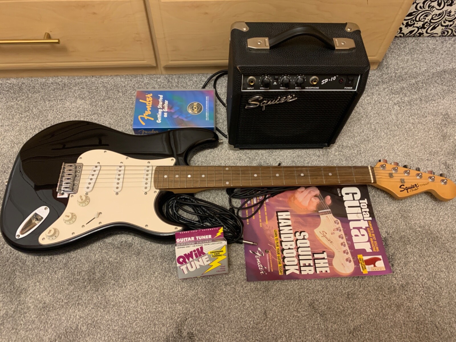 Squier Strat by Fender electric guitar and amp package in great