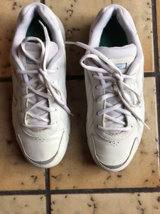 white sneakers blue sole