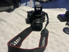 Canon EOS Rebel T2i DSLR. 2 cameras total, rechargeable batteries and canon bag 