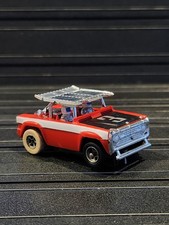 Aurora AFX Ford Bronco Baja Red HO Slot Car. Magna Traction. ZZZ