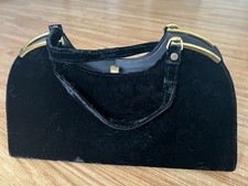 Vintage Bobbie Jerome Purse with clasp closure.