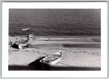 Vtg B&W Snapshot Quiet Beach Boats Fisherman Scene 1950s
