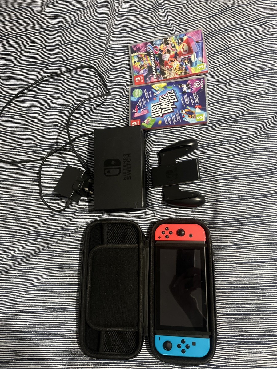 Nintendo Switch with mario kart and just dance Also a TV