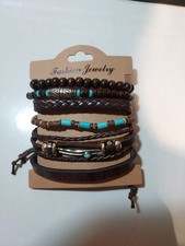 A set of 6 Boho style stacking leather and bead unisex bracelets