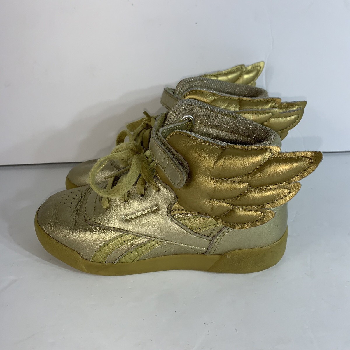 Gold Wonder Woman Reebok Shoes Sale Wonder Woman Reebok Freestyle