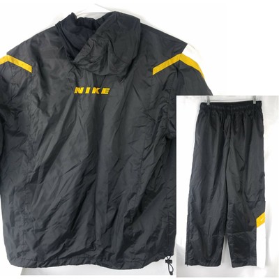 nike black and gold sweatsuit