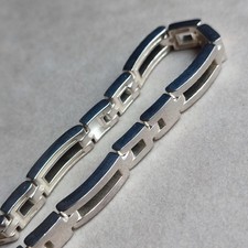 35,9g Bracelet articulé en Argent 925 poinçon minerve. XXème
