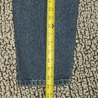 Blue high-waisted L.L.Bean mom jeans, made in USA, size 12, with yellow measuring tape across the waistband.
