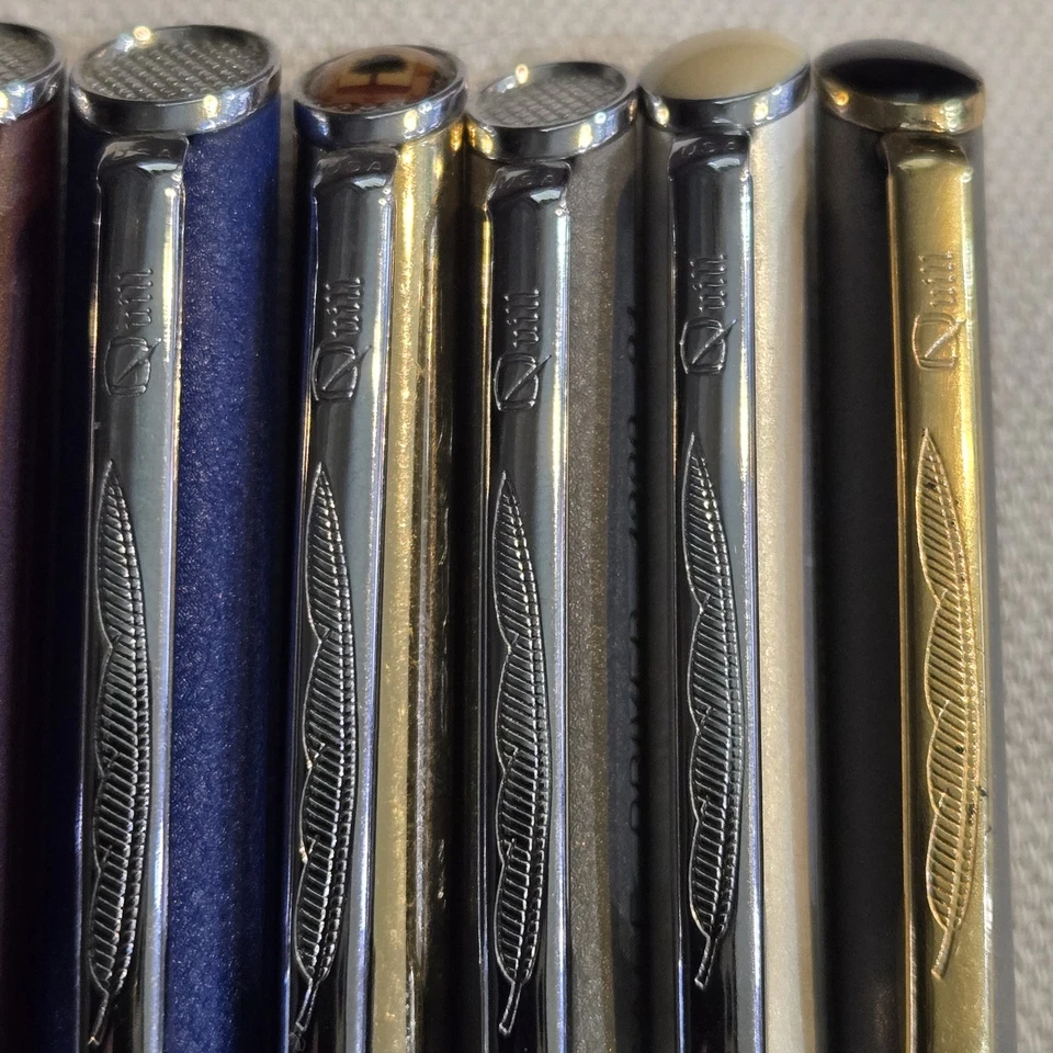 Lote de 9 canetas esferográficas e lápis mecânicos de pena torção - Imagem 4 de 4