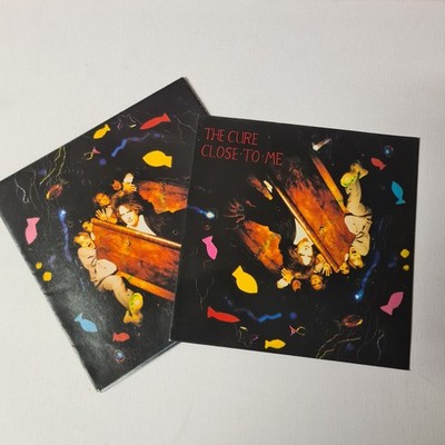 THE CURE    CLOSE TO ME/A MAN INSIDE MY MOUTH  VINYL 7'' {WITH POSTER} 1985