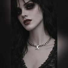 Silver X necklace with a bold and edgy vibe #...