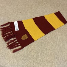 Harry Potter Gryffindor knit scarf features bold maroon and gold stripes