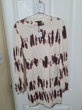 Zara tie-dye long-sleeve knit dress in a mauve and cream colorway