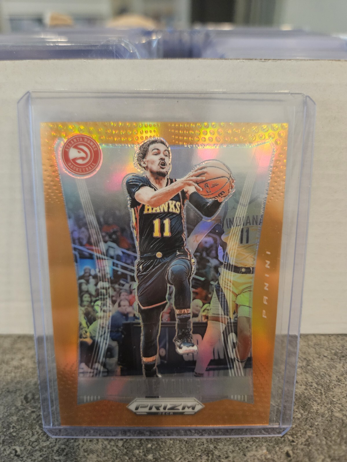 2023-24 Panini Prizm Deca Basketball Orange /49 Prizm Trae Young #109 Atlanta...
