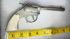 A 1955 WYANDOTTE Sheriff cap gun with loads of detail on it.