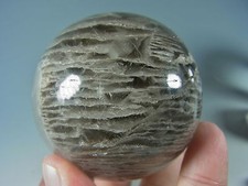 2.87" 2.56"POLISHED QUARTZ CRYSTAL SPHERE WITH DISSOLVED LAYERED CALCITE  N93