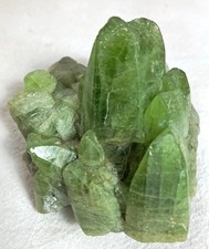 LARGE MUSEUM GRADE CLUSTER OF PERIDOT CRYSTALS, 830 CARATS - PAKISTAN