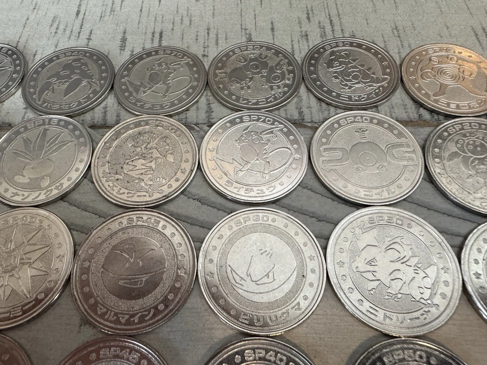 老式明治神奇宝贝金属战斗硬币53枚-皮卡丘、钱西等! — 第 3/4 张图片