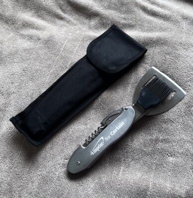 6 in 1 BBQ Multi-Tool, Spatula, fork, knife, brush, bottle opener, cork screw.