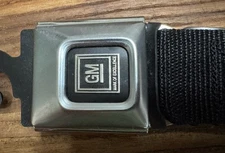 GM Logo Seatbelt Belt BUCKLE -DOWN Metal Badge Made In USA Mark Of Excellence