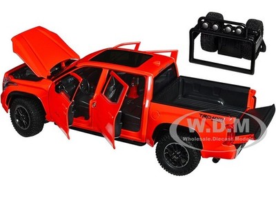 2023 TOYOTA TUNDRA TRD 4X4 PICKUP ORANGE W/WHEEL RACK 1/24 DIECAST