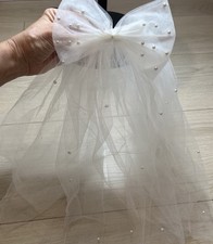 White tulle veil with pearl embellishments hair clip bridal wedding